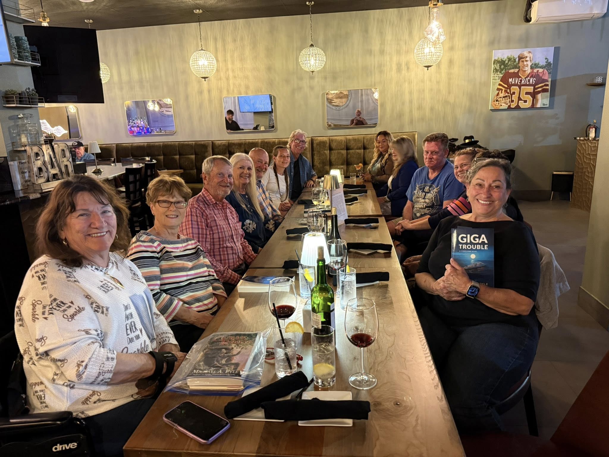 Group photo at the Giga Trouble presentation and book signing at 35 Bistro, Daytona Beach